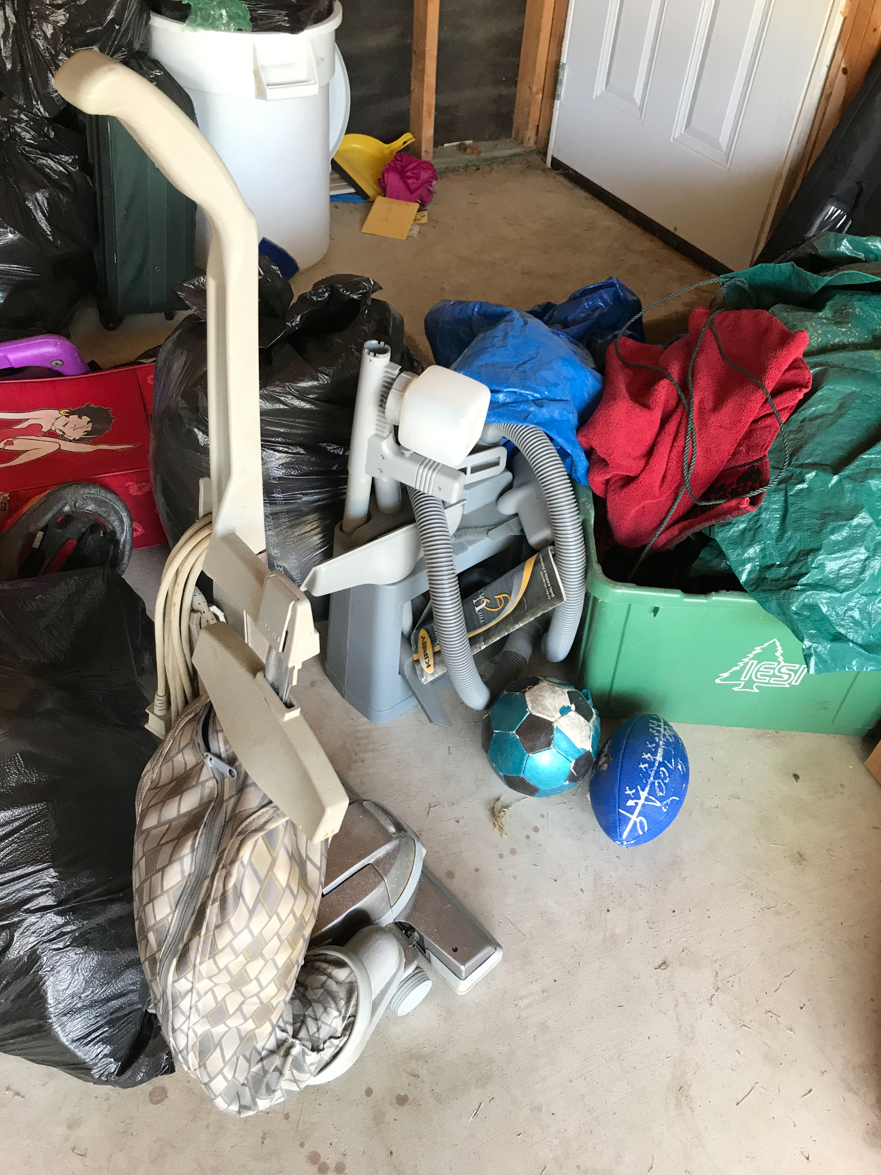 A collection of household items prepared for sorting